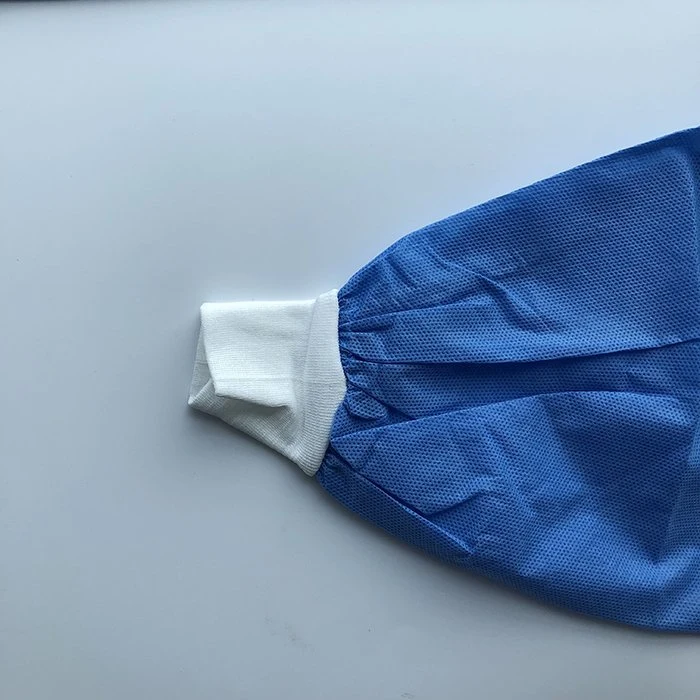 Batas de laboratorio desechables para adultos con bolsillos duraderos y sin látex Chaquetas de laboratorio azules con puños y cuello de punto