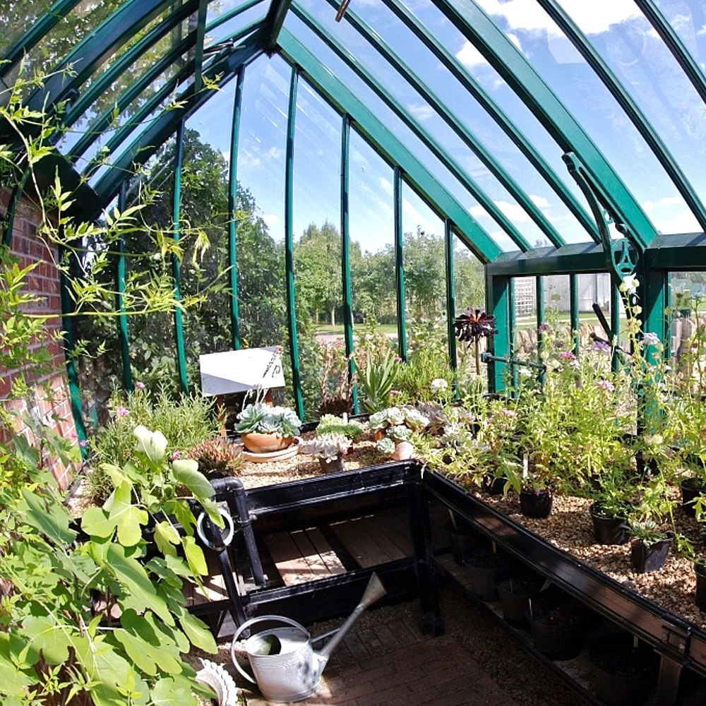 Film/Glass Horticultural Small Garden Greenhouse with Coffee/Tea Chat Desk/Seed Rack/Fan/Flower Vegetable Feed