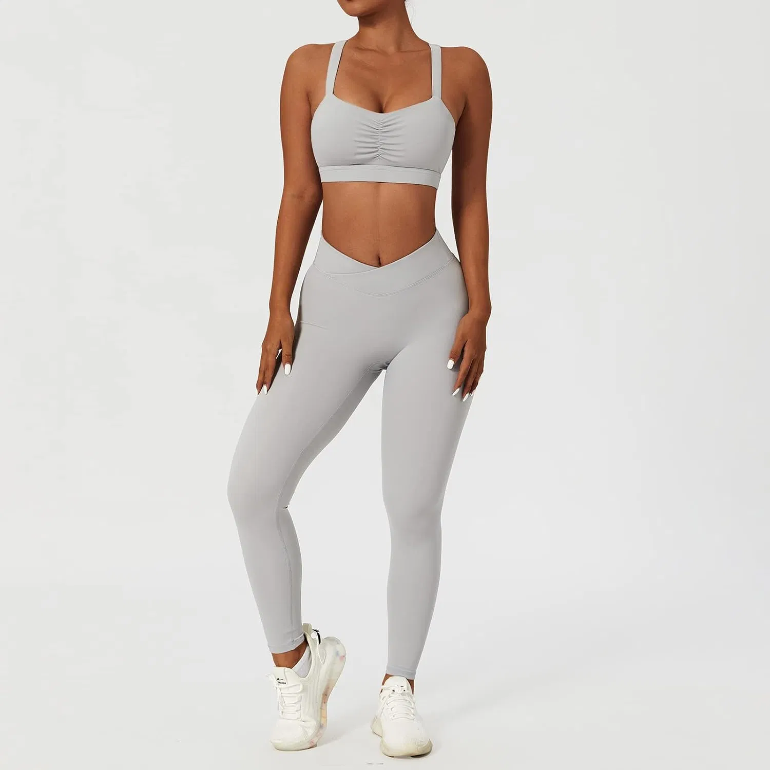 Os treinos para mulher definem leggings de cintura subida de 2 peças com cintura cruzada Ginásio de exercício de sutiãs de desporto com alças