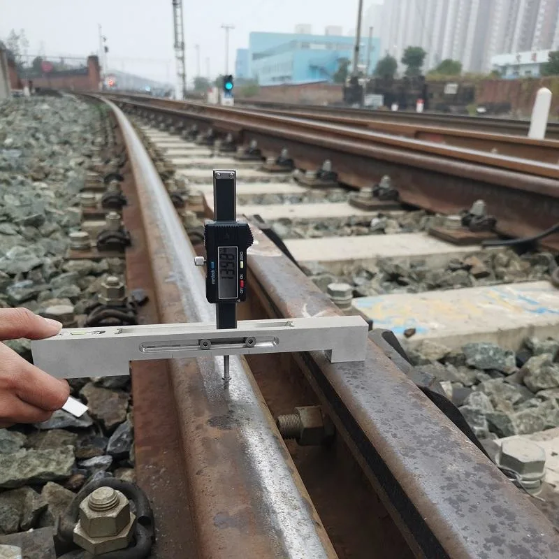 Commutateur numérique et la traversée de la jauge de mesure d'usure pour l'interrupteur de rail