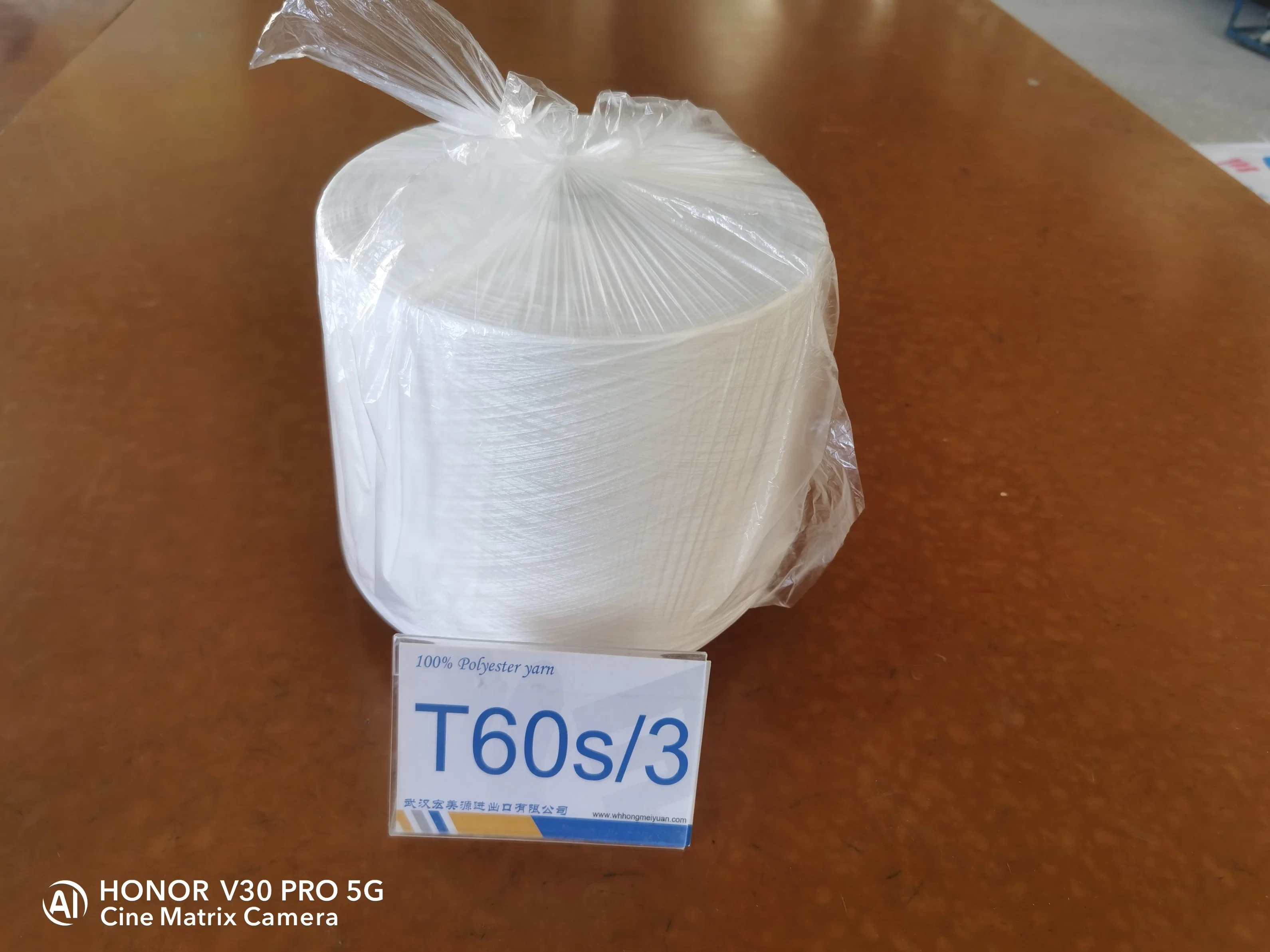 100% Yizheng210 Polyester Spun Yarn Count 60s/3 Tex 27 for Wovens Sportswear General Fabrics