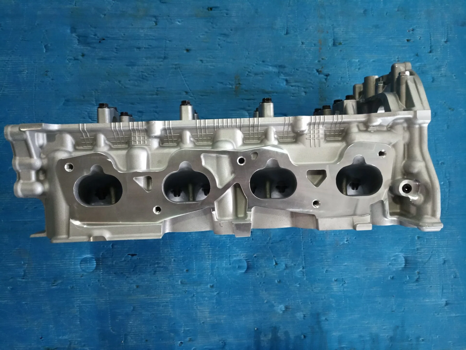 Milexuan Auto Engine Part Cast Iron Auto Accessories Qr25 Qr20 Cylinder Head 110405X00A for Nissan Cabstar Np300 Pickup (D22) 2.5dci