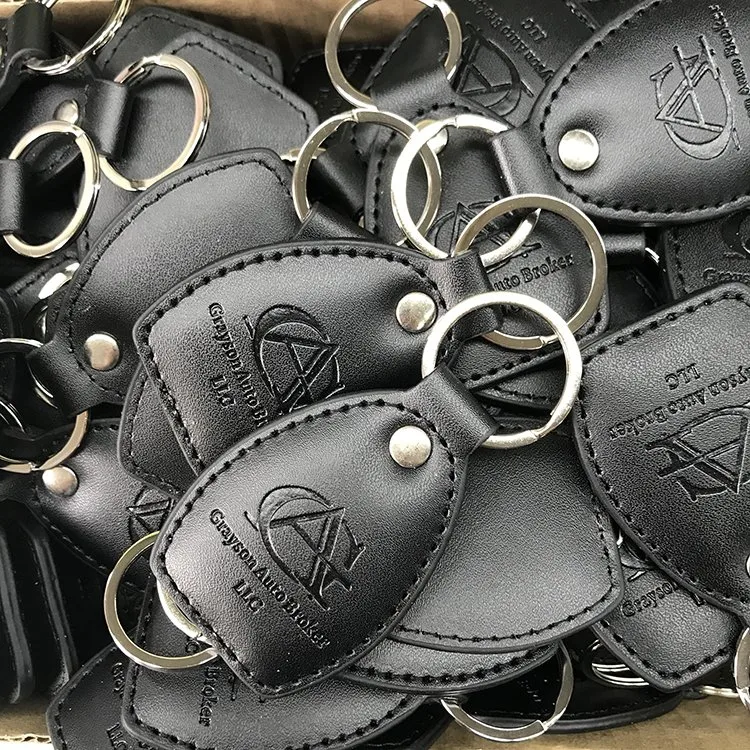 Cheap Key Tag Chain Wholesale/Supplier Design Custom Logo Leather Keychains for Decoration