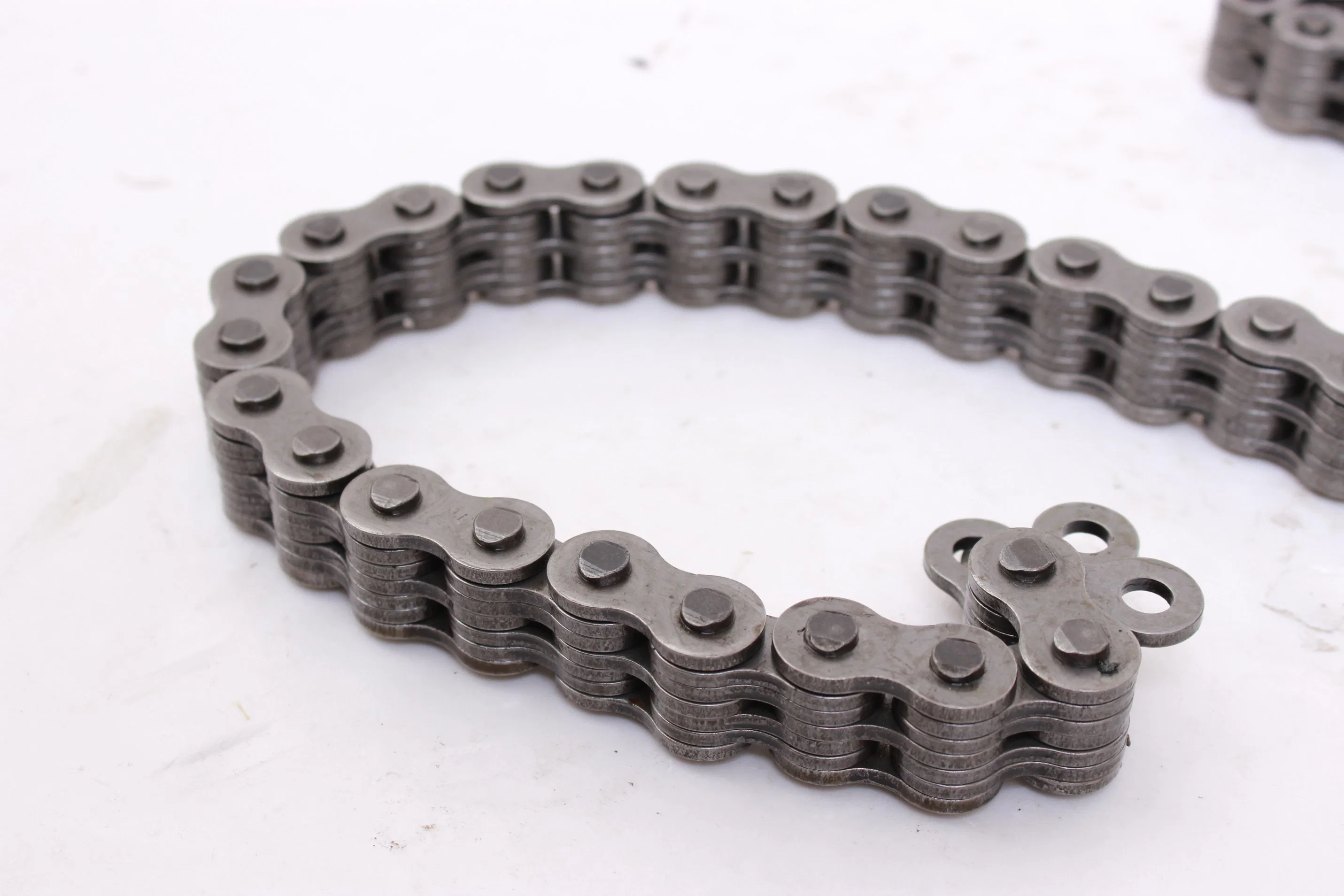 ANSI Bl-446 Rollerless Leaf Chain for Sky Stacker Car Parking Forklift Hoisting Machinery