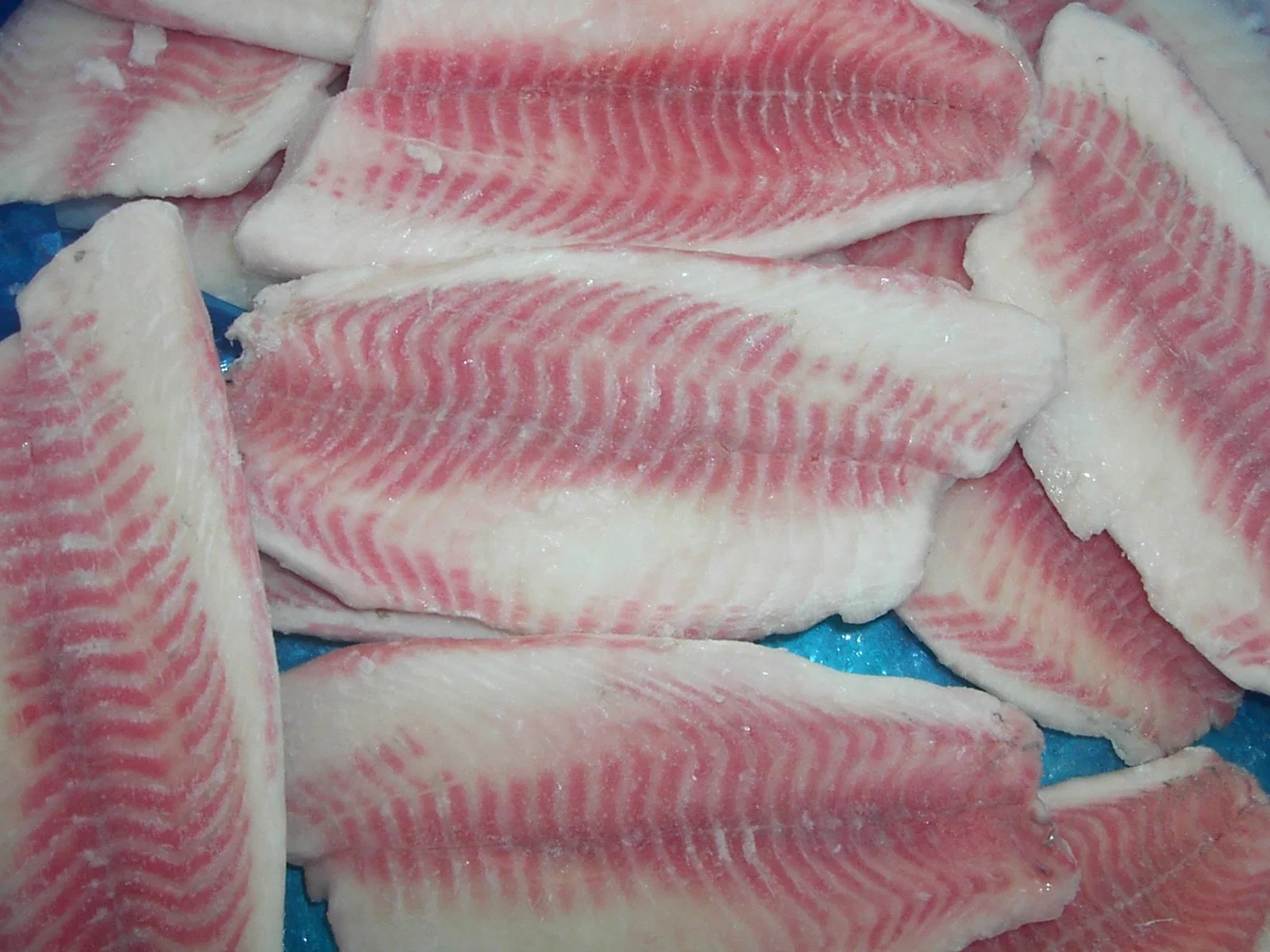 Sinocharm Fresh Frozen Fish Seafood Black Tilapia Fillet Skinned