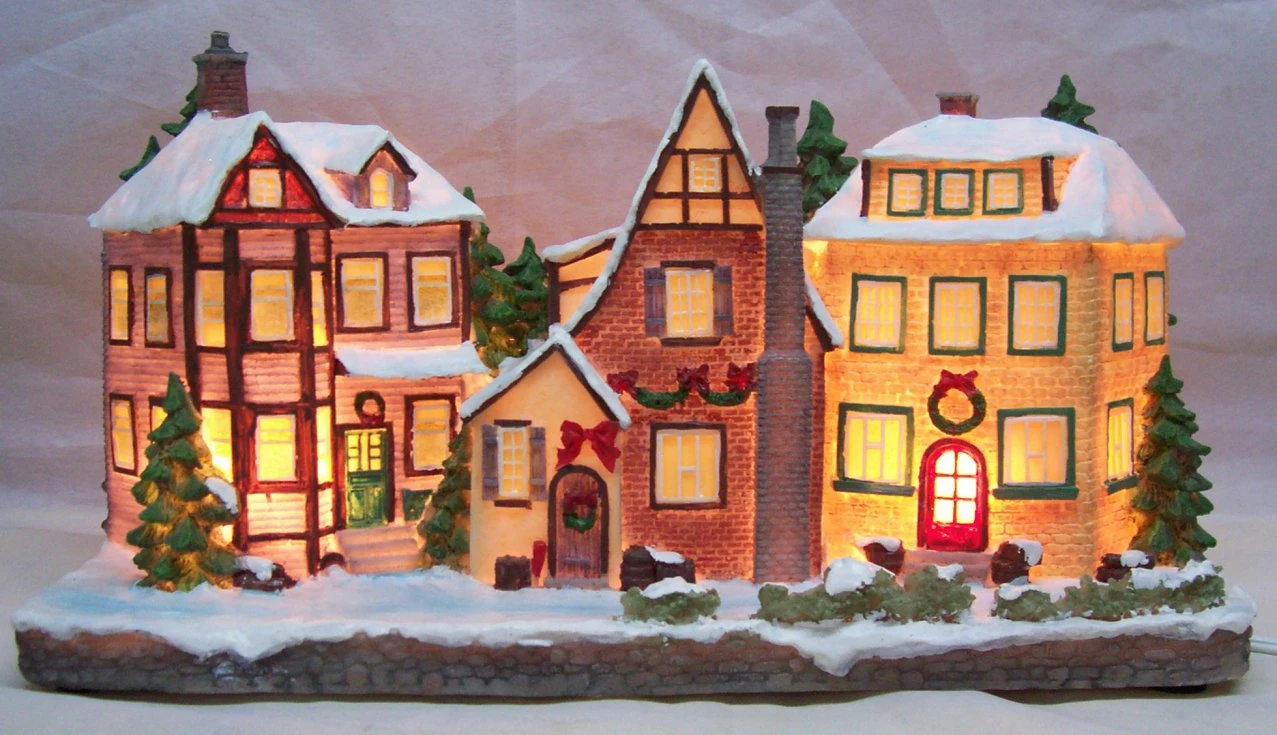 OEM Factory Customized Christmas House Christmas Table Decoration Christmas Village LED Lights Enchanted Miniature Toy House Model Manufacturer in China