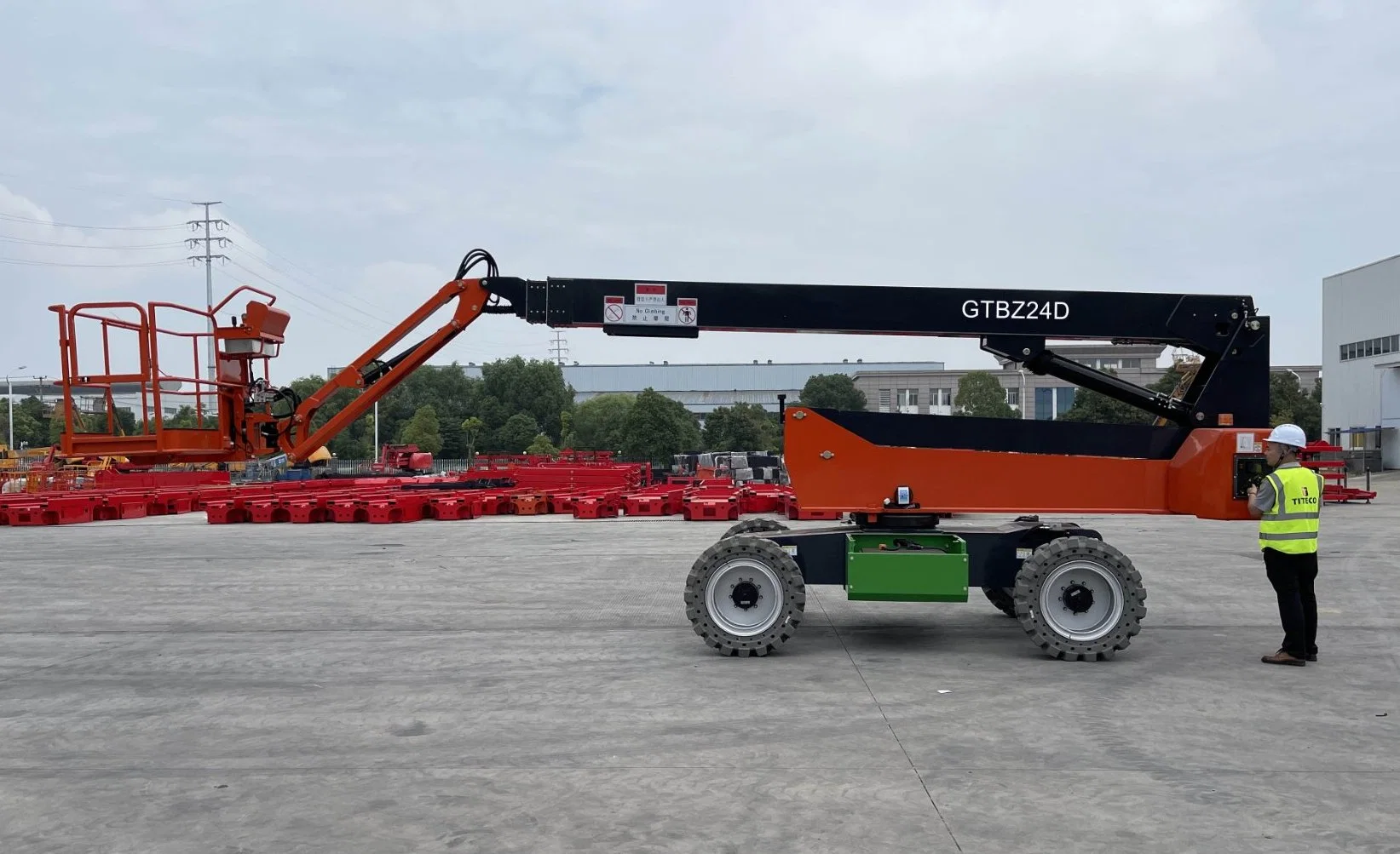 Gtbzz24D 24m altura de trabajo 300kg capacidad de neumáticos sólidos movibles Terrian Li-ion batería de energía de Cherry Picker/Man Lift/Telescopic Boom Lift