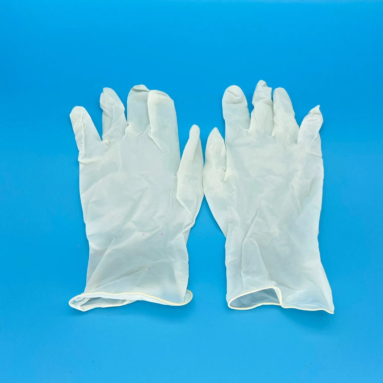 5.0G blanco desechables de látex sin polvo Guantes de látex guantes de caucho natural de examen