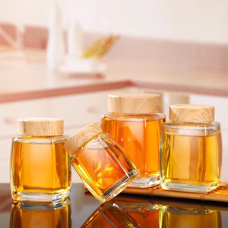 50ml 100ml 180ml 280ml 380ml 750ml Unique Square Shaped Clear Glass Honey Bottle Jar with Wooden Lid for Honey Pudding Jam