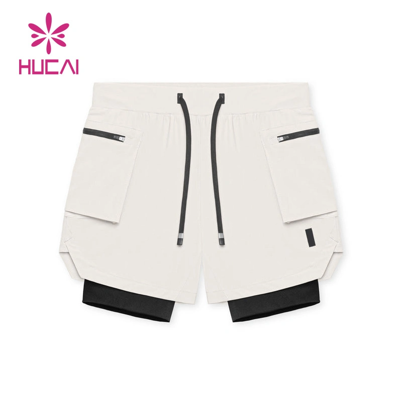 OEM ODM Personnalisé à la mode Fonctionnel de haute qualité Course Fitness Gym Lâche Actif Athlétique Superposé Fermeture éclair Cargo Hommes 2 en 1 Shorts de sport.