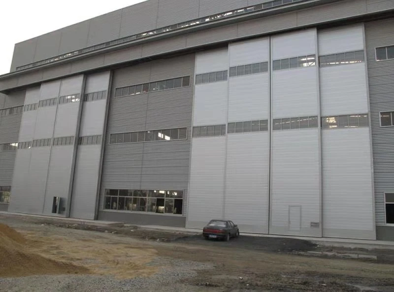 أبواب دحرجة صناعية كبيرة مضادة للرياح لمصنع المستودع مرآب كبير