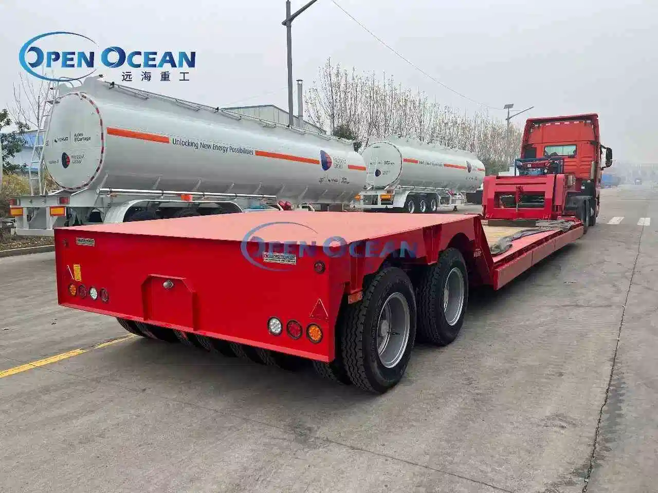 55ton Max Payload More Sales 3 Axles Lowbed Semi Truck Trailer