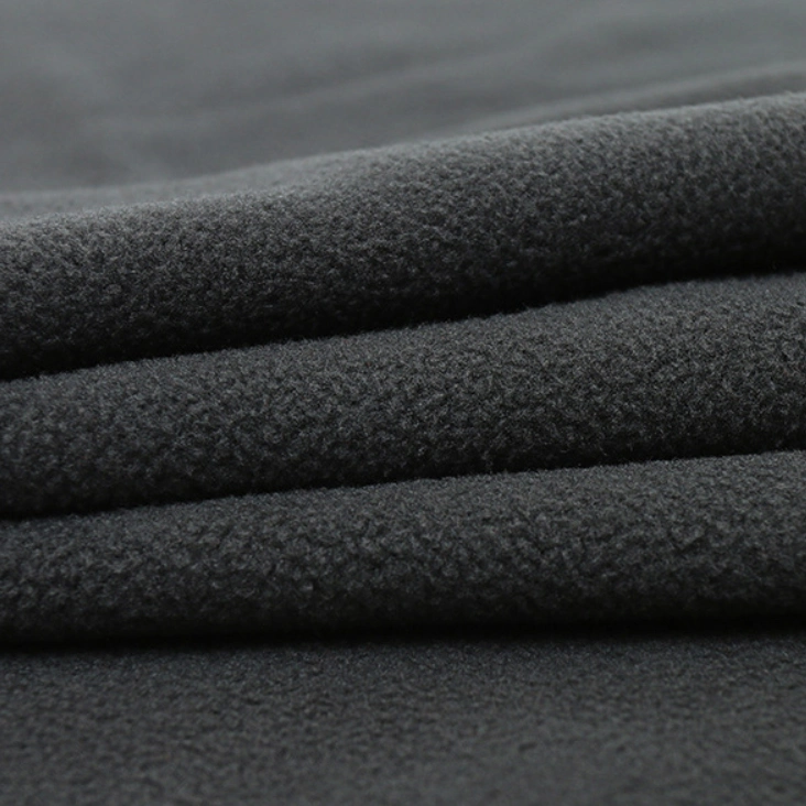 Tecido de poliéster têxtil trecho de 4 vias vinculado com tecido Softshell velo polar