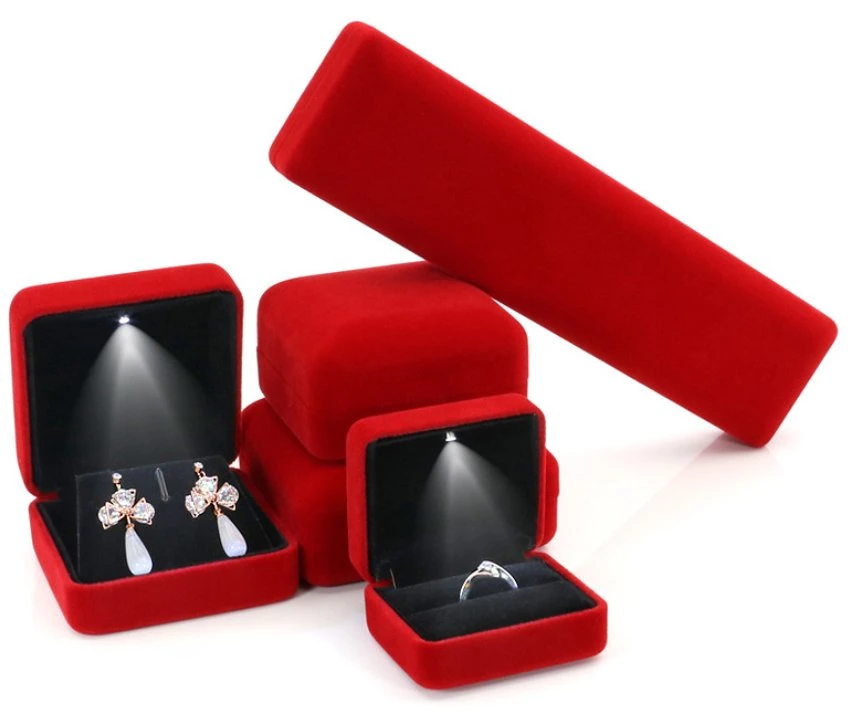 Boîte de velours de l'emballage en plastique de gros anneau de bijoux boîte avec des voyants LED