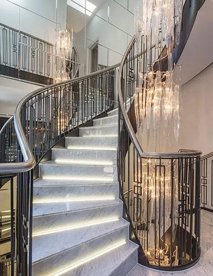 Modern Residential Indoor Marble Curved Staircase Custom Steel Parts Marble Sintered Stone Spiral Stairs