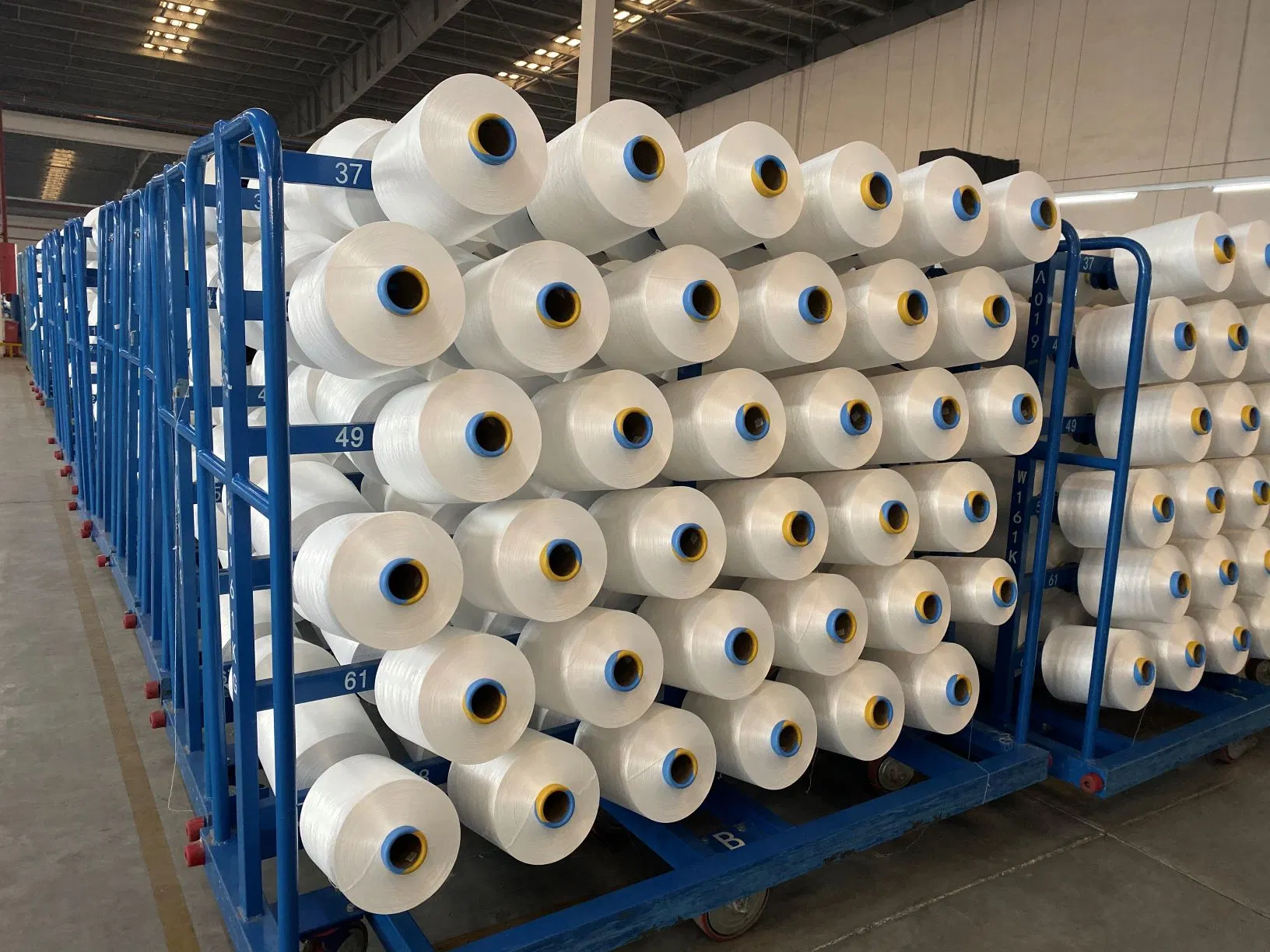 Chinese Manufacture Polyester Yarn 100% Recycled Polyester Nim SD Spadnex Filament Yarn DTY 75D/48f Yarn for Knittingaa Grade 100% Recycled Polyester Yarn Prof