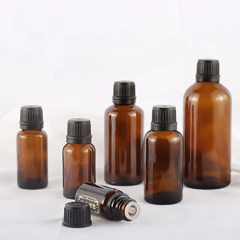 Wholesale 5ml 10ml 15ml 20ml 30ml 50ml 100ml Amber Glass Essential Oil Bottles with Plastic Tamper Evident Caps and Drip Plugs