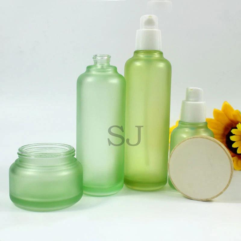 Frosted Green Glass Cosmetic Packgaing Bottle and Jar Set with Bamboo Lid for Face Cream Skincare Lotion Serum