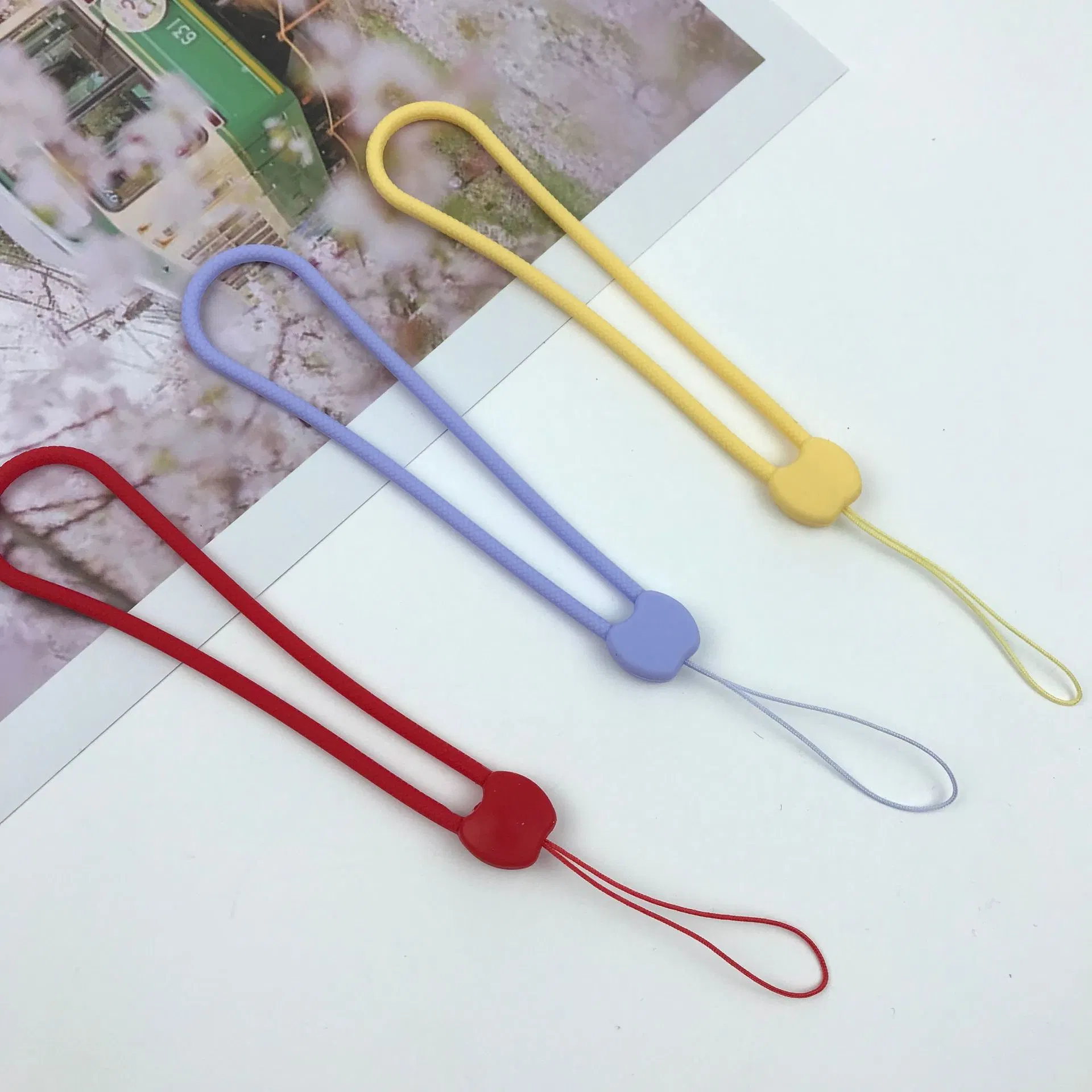 New Silicone Apple Short Mobile Phone Sneeper U Disk Fan Umbrella Is Suitable for Anti -Drop Wrist Rope Manufacturers Wholesale/Supplier