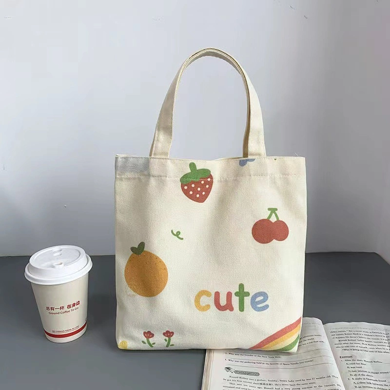 Wholesale/Supplier Kids' High quality/High cost performance  Fashionable Cartoon Print Colour Canvas Tote Bag Shopping Bag for Student Lunch Cylinder Bento Bag