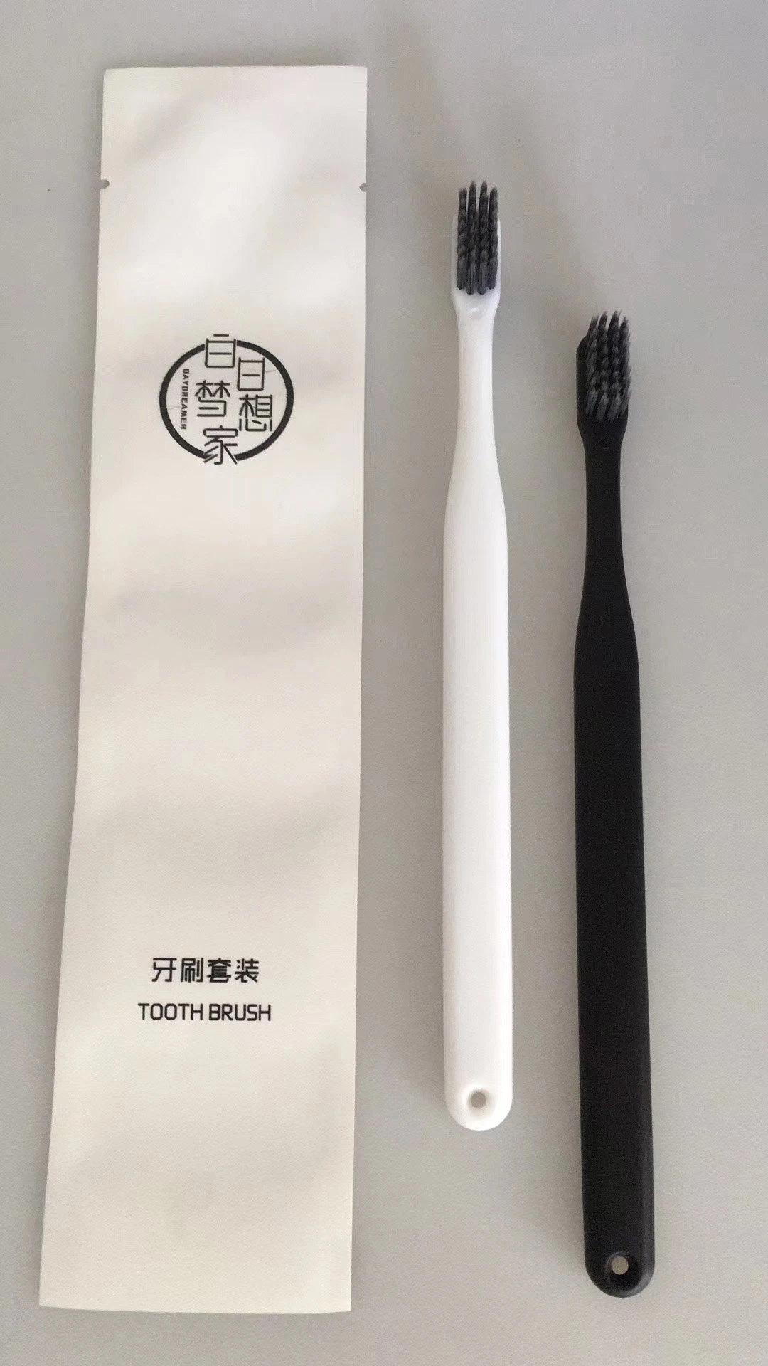 Biodegradable Toothbrush in Sachet for Hotel Room Using