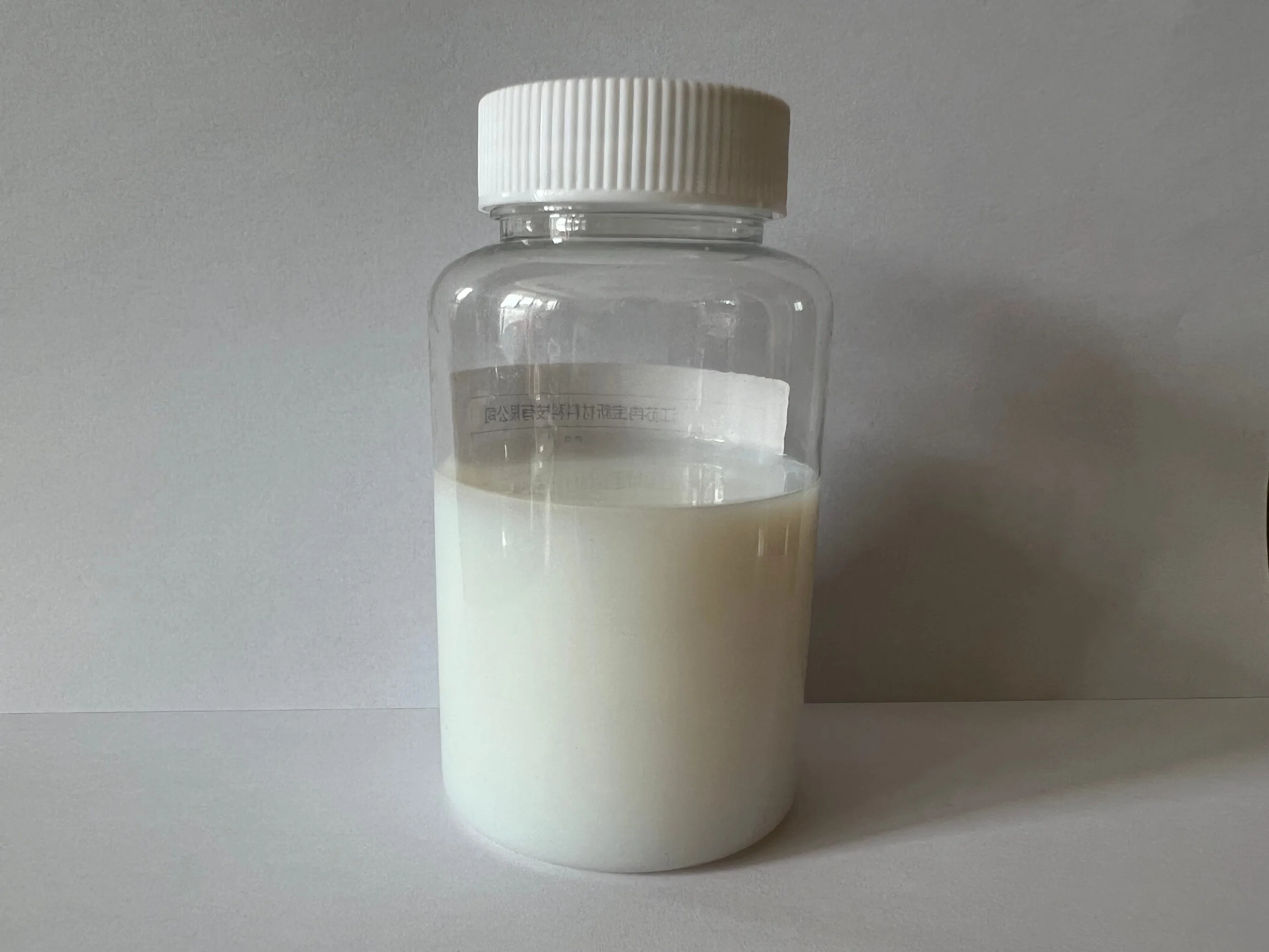 Fabric Finishing Agent Milky-White Liquid Waterproof Crosslinking Agent JL-107 for Chemical Fiber, Cotton and Their Blended Fabrics