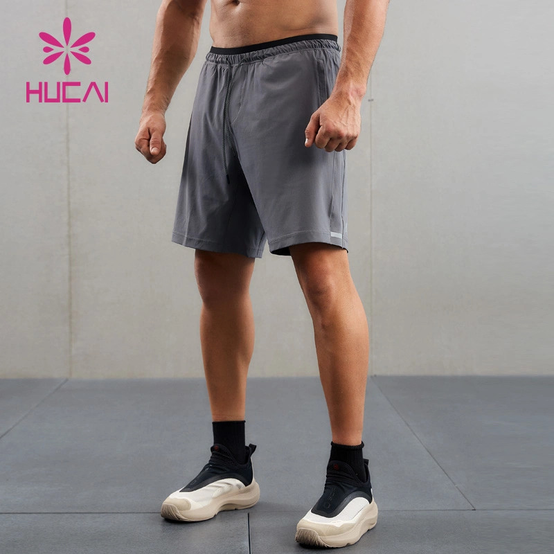 Custom ODM High Performance elastische modische Rückseite Telefon Tasche Workout 2 in 1 Innenshorts für Herren Schnelltrocknende Gym Fitness Shorts