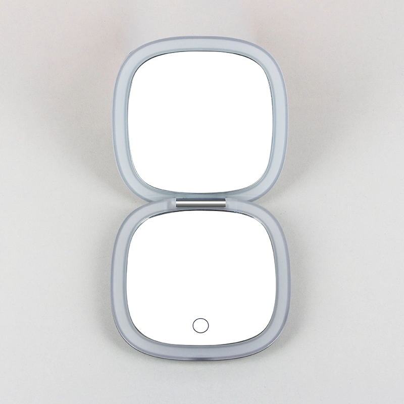 Nueva llegada Plegado doble 1X/10X de la pantalla táctil LED Lupa espejo de maquillaje Espejo con luces