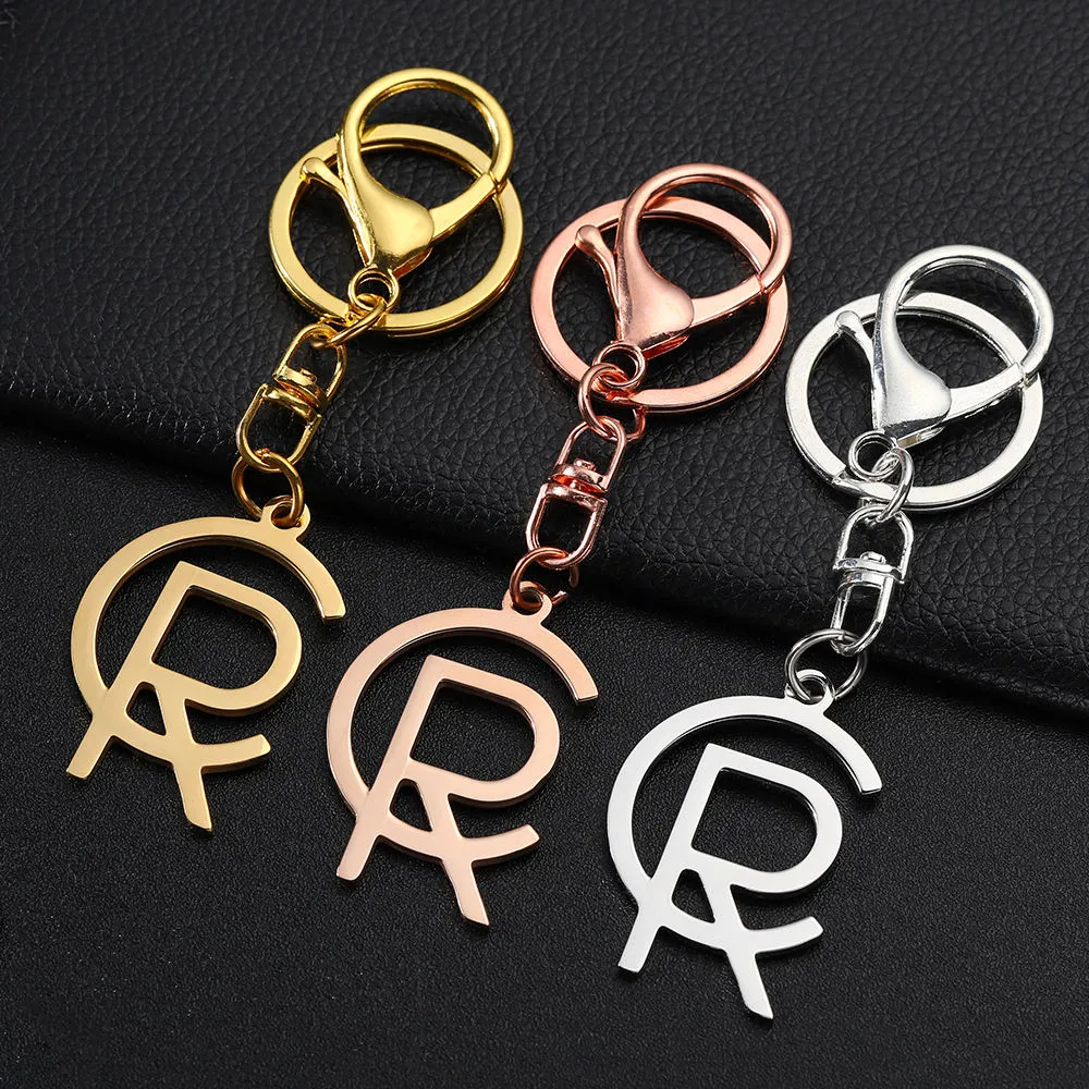 Logótipo personalizado Gold Silver Rose Gold Key Chain de alta qualidade Acessórios de porta-chaves de corte com corrente metálica em aço inoxidável Letter