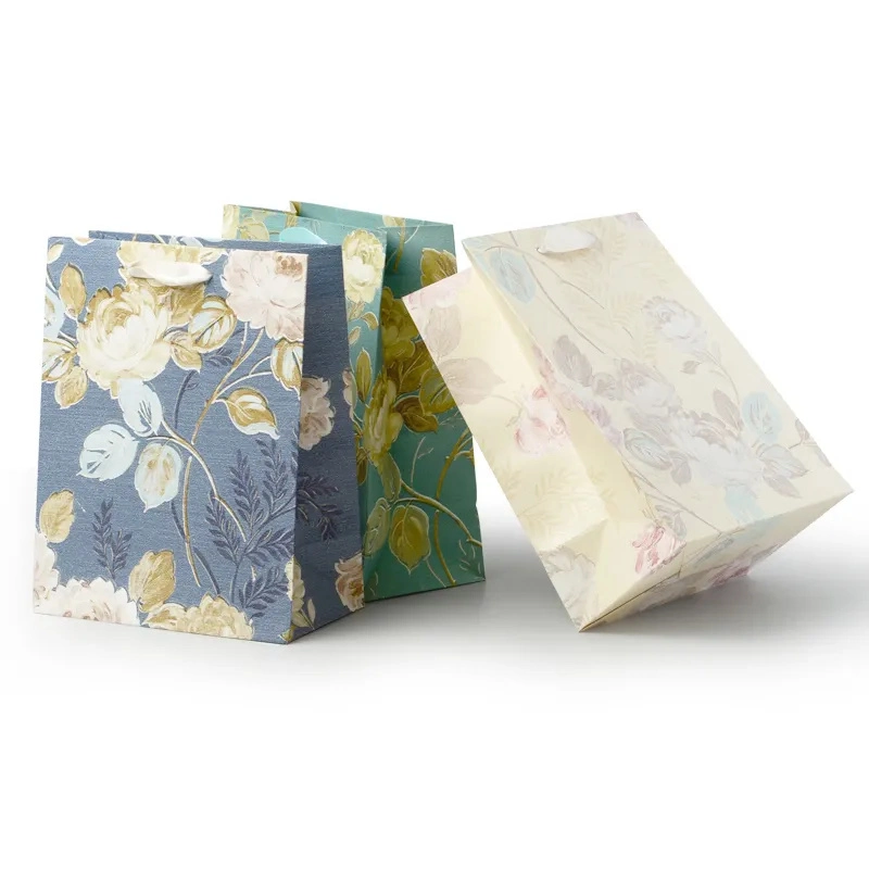 Customised Waxed Bolsas De Papel De Colores DuPont Tyvek Fancy Jewelry Party Gift Paper Bags