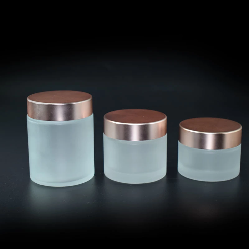 Haute qualité Vide 30g 50g 100g Pot cosmétique en verre mat avec couvercle en or rose.
