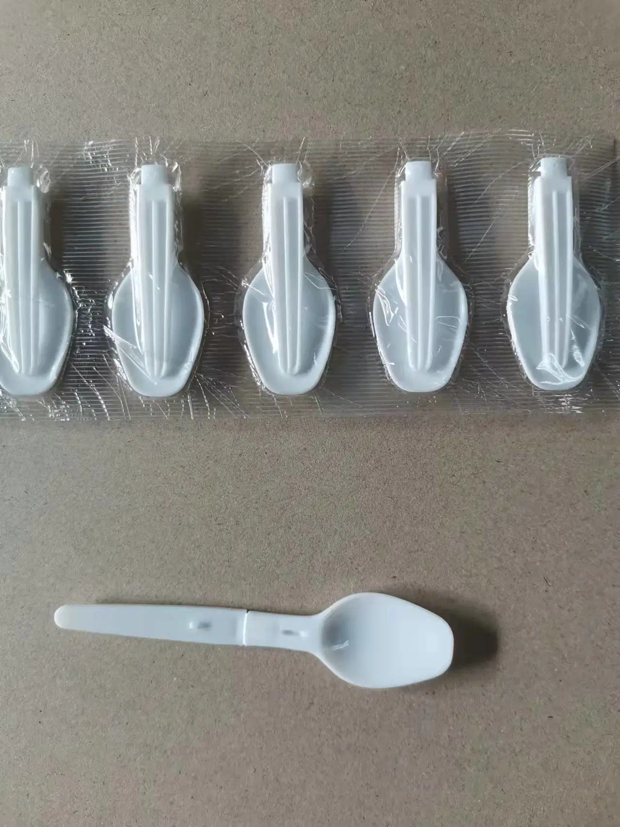 Fabricante Venta desechable biodegradable Blanco Flatware Mini Foldable PLA Cucharas de plástico