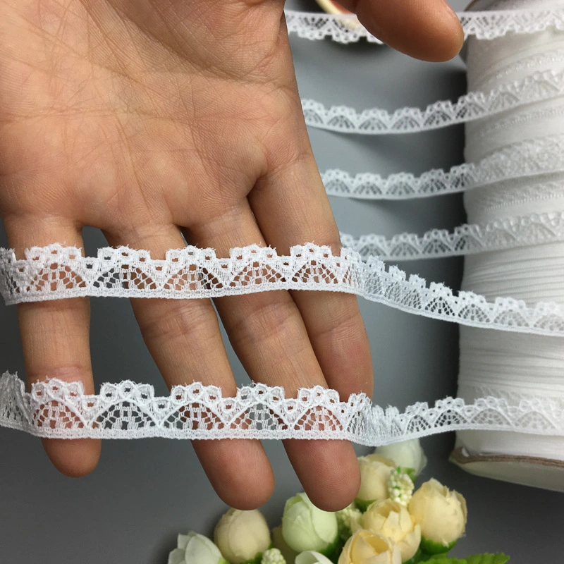 Fábrica de encaje de nylon Nuevo diseño patrón de flores bordado Crochet nupcial Tejido de algodón con ribete de encaje y ojales para accesorios de ropa