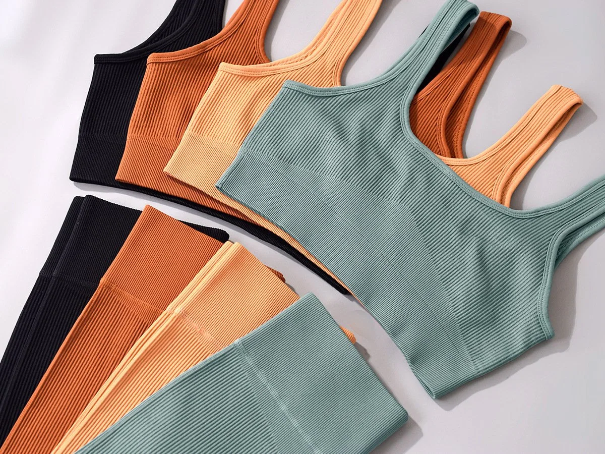 Hot Sale femmes nervure transparente Taille haute Jambières de vêtements d'entraînement de fitness de deux ensembles de vêtements de sport Quick-Drying morceau Yoga
