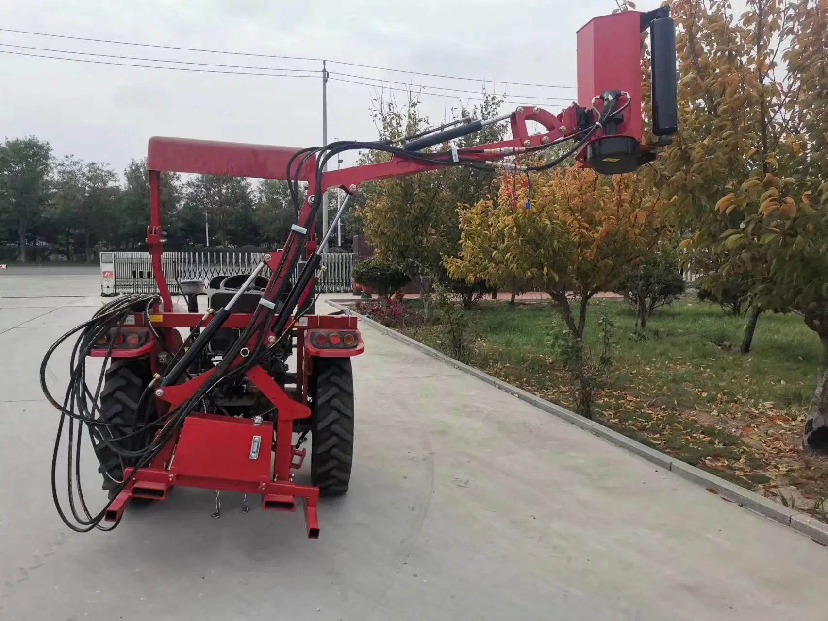 Tractor Provides Power to Drive Gear Pump to Drive Hydraulic Operated Cantilever Lawn Mower