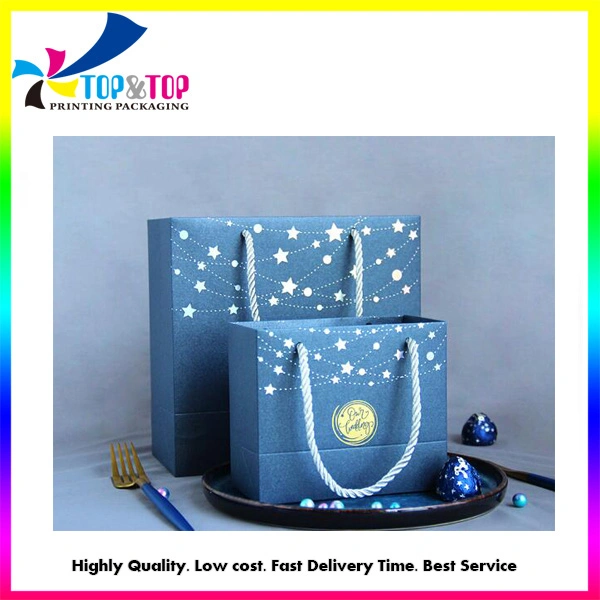 Factory Price Wholesale/Supplier Luxury Blue Hot Stamping Christmas Stars Wedding Candy Suits Paper Packaging Shopping Gift Bag