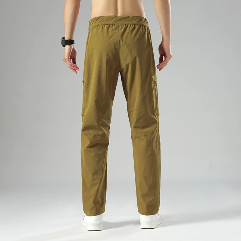 Pantalones de moda pantalones multifuncionales cintura elástica hebilla Zipper bolsillo piel Pantalones amistosos para hombres