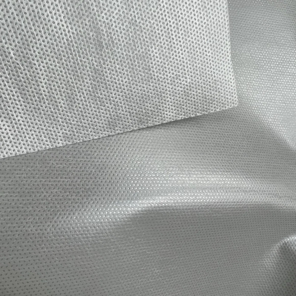 Film-Reinforced Fabric PE Film Coating PP Non Woven Fabrics Used for Protective Clothes Surgical Gown