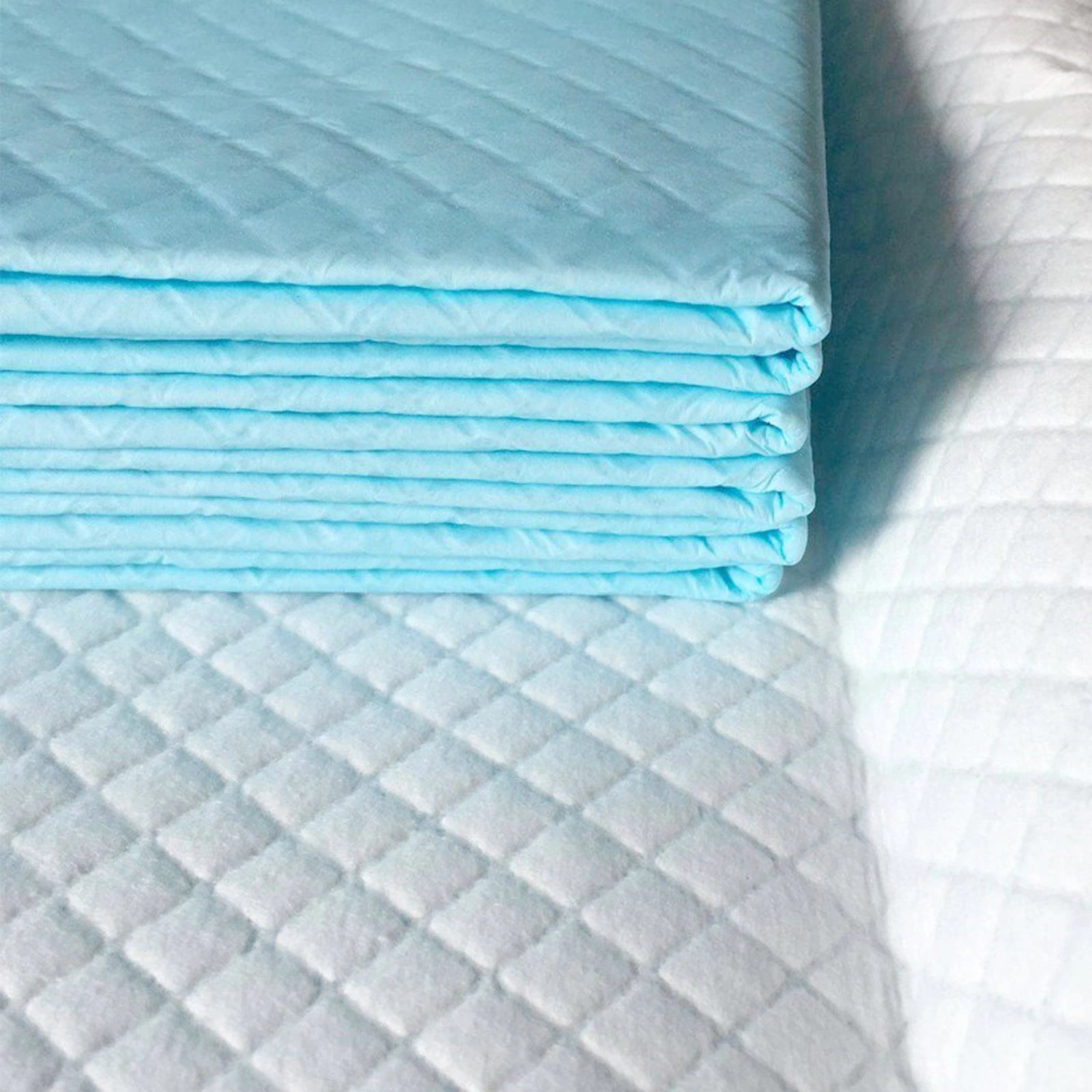 Tapis à langer jetables en gros, absorbants, imperméables, matelas portables, respirants, anti-fuites pour l'incontinence.