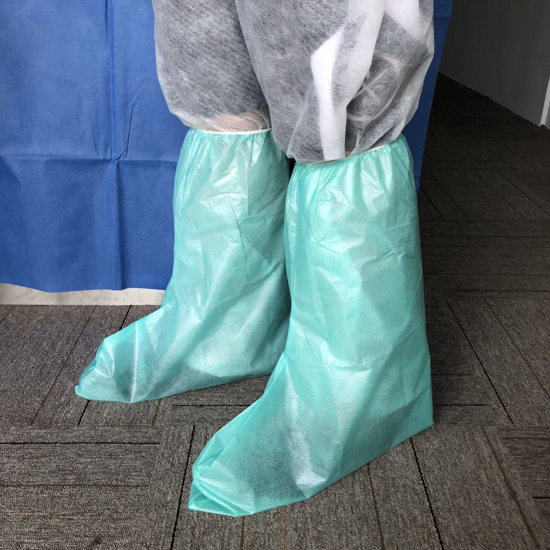 ISO13485 Disposable Nonwoven Pharmaceutical Surgical Medical Nonskid Waterproof Plastic Knee Length PP/PE PE Coated Boots Foot Strap Overshoes for Painting