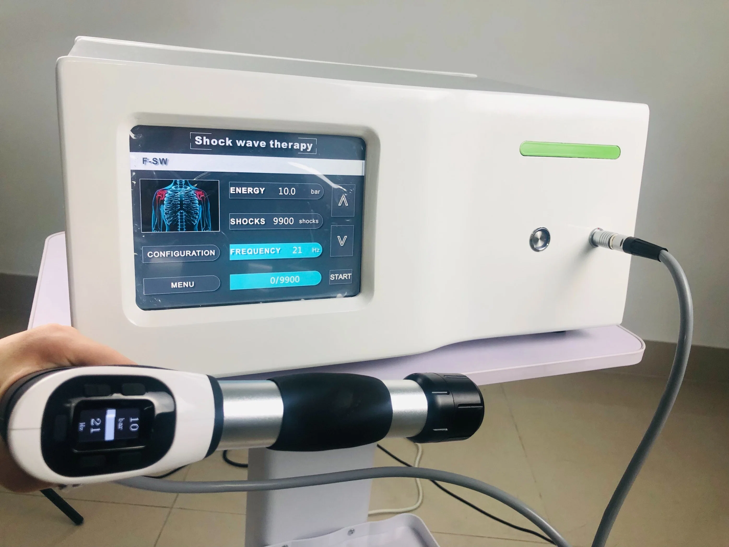 La terapia de ondas de choque de la máquina para el alivio del dolor Tratamiento de lesiones del deporte ed.