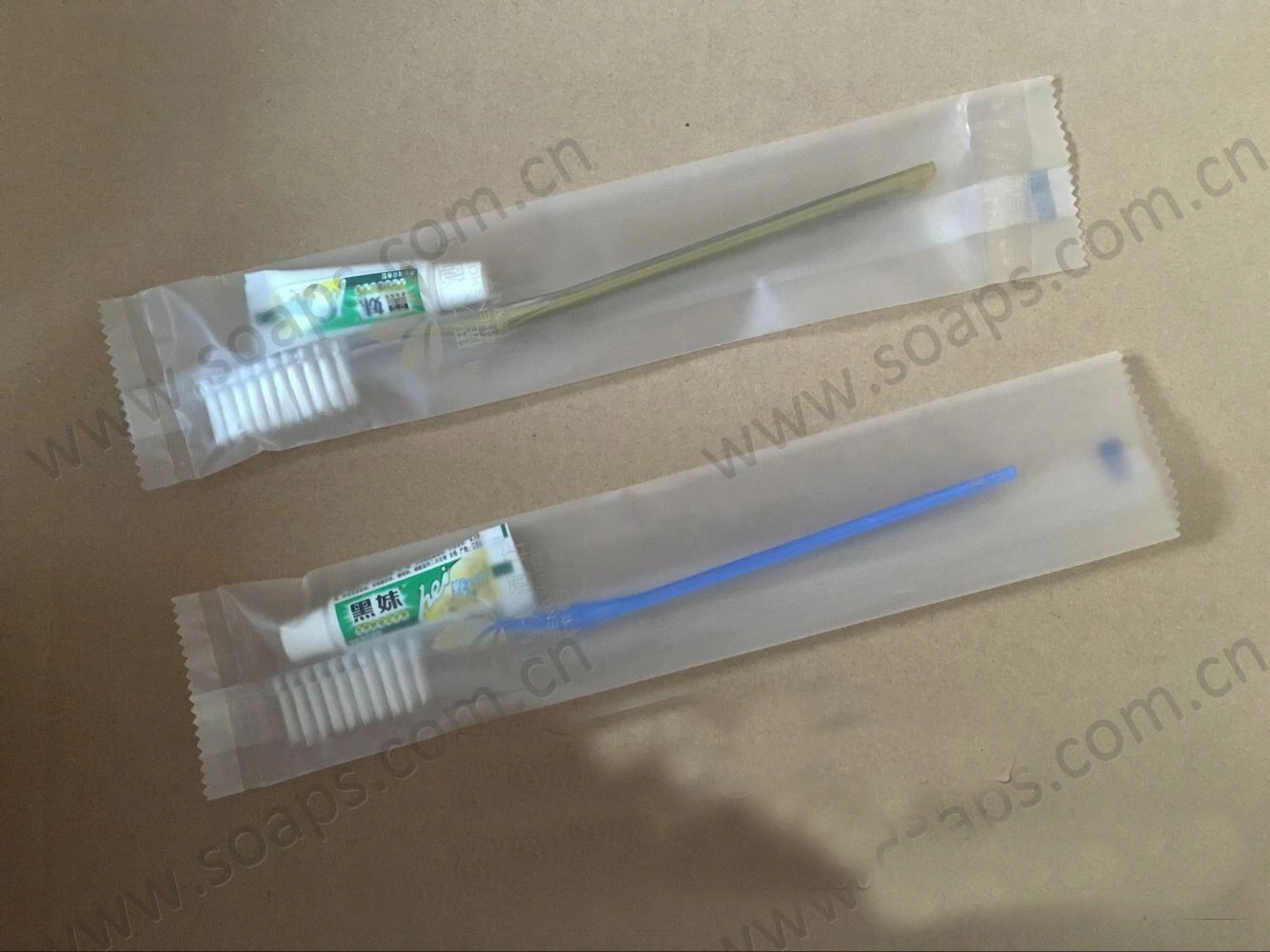 Hotel Amenities with Toothbrush and Toothpaste in Plastic Packing