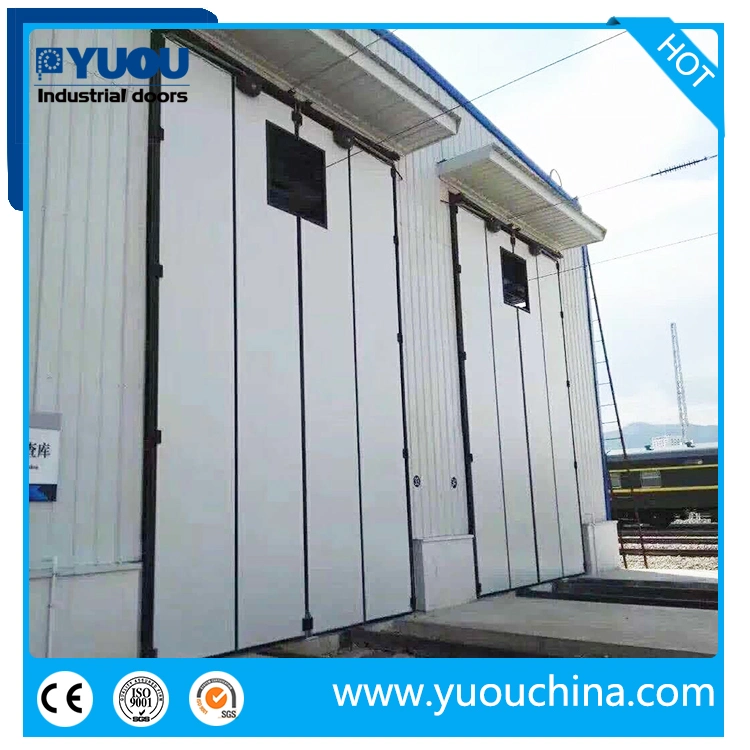 Industrial Manual or Automatic Aluminium Steel Sandwich Panel Thermal Insulated Big Size Sliding Bi Folding Door for Fire Station Center Subway Train Station