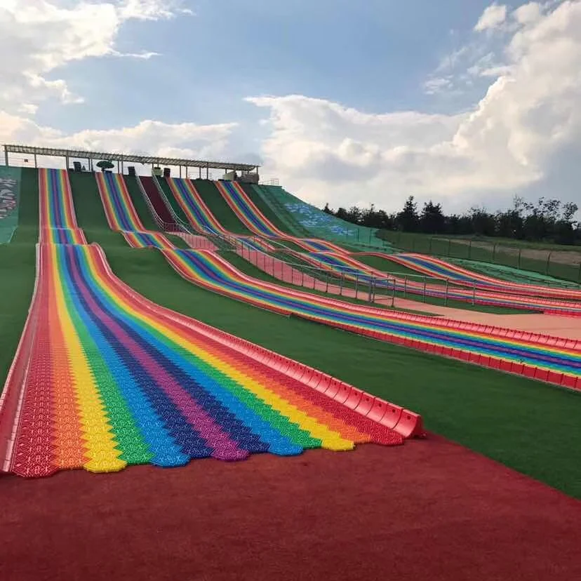 Beliebte Outdoor Spielplatz Amusement Fun Park Fahrten Ausrüstung Kunststoff Regenbogen Regenbogen Trockene Schnee Schlauchrutsche