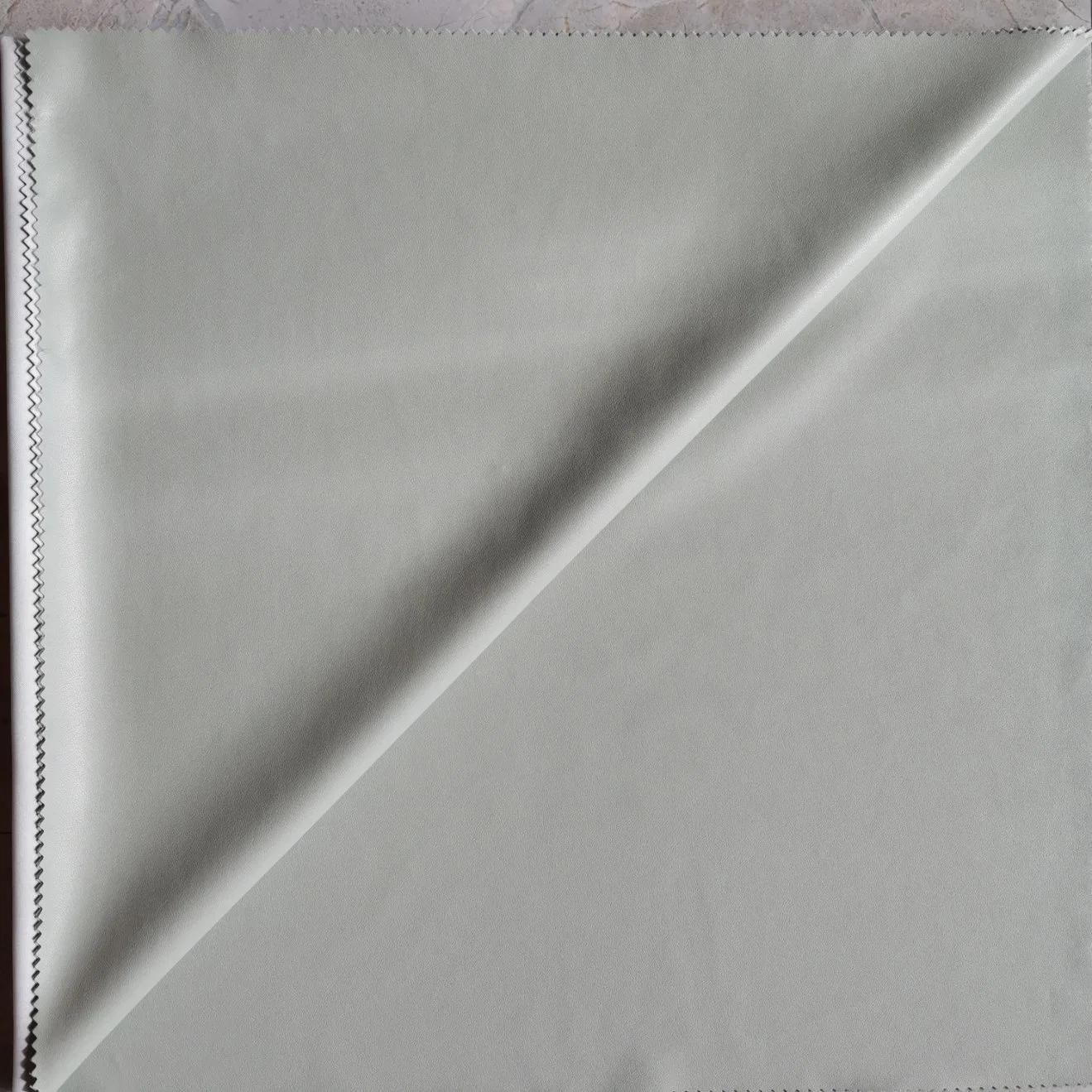 Manufacturer Light Weight Synthetic PU Leather Fabric with Soft Hand-Feel for Trench Coat