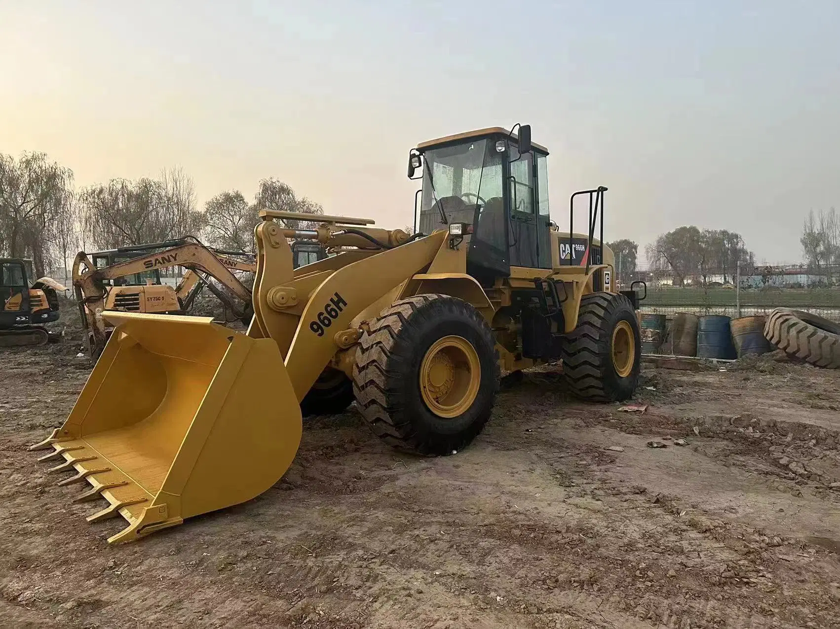 اللودر بعجل المستخدم Cat 966H للبيع من Caterpillar