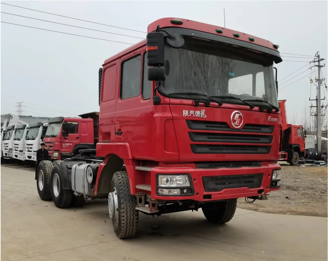 Bajo precio que se utiliza 6X4 Shacman tractor camión cabeza IZD Rhd 380CV de caballos de fuerza motriz para la venta de camiones tractores