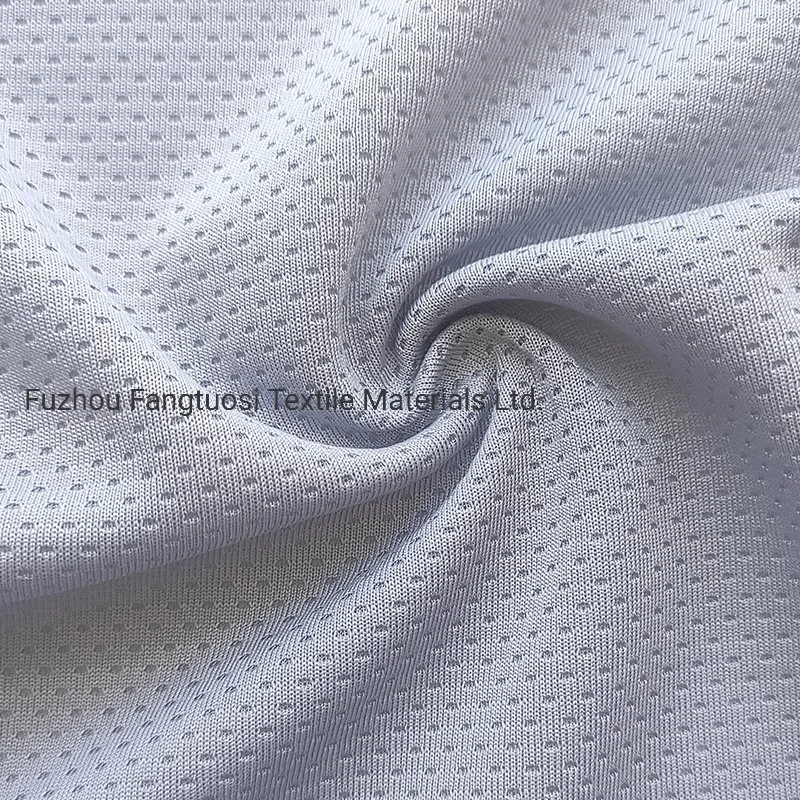 Material de malha de tricô interlock esportivo em poliéster 100% para roupas de futebol.