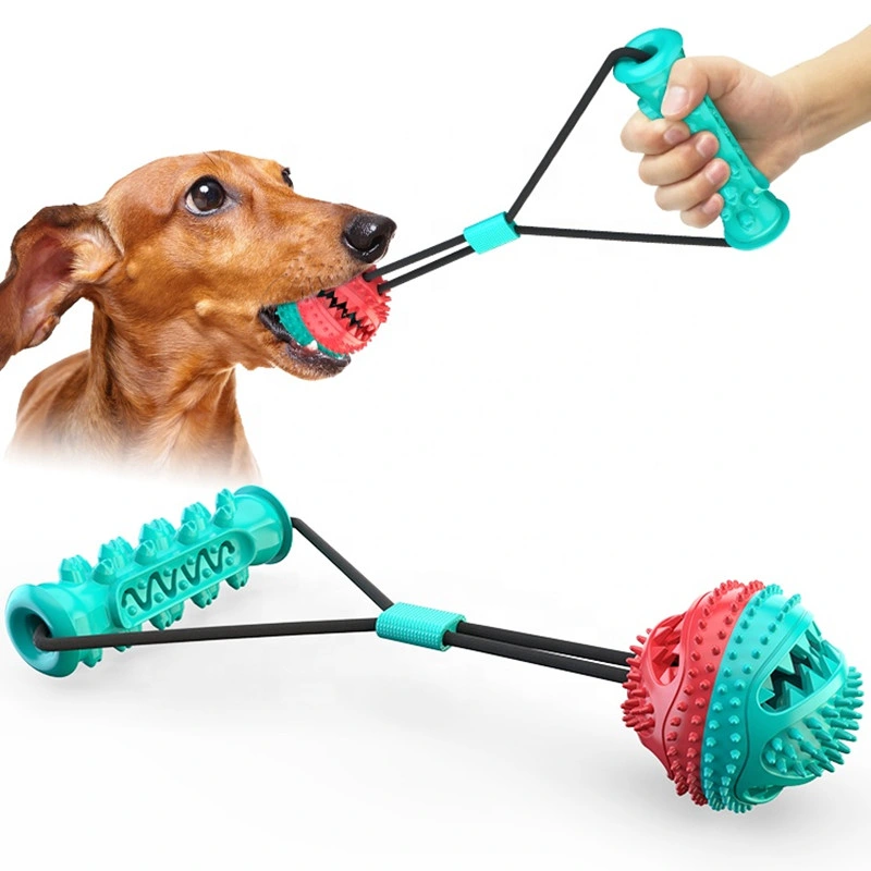 Nuevo diseño de juguete para perros de pelota de juego y rompecabezas con masticables y golosinas de caucho. Juguete de pelota de goma para perros con movimiento infinito.