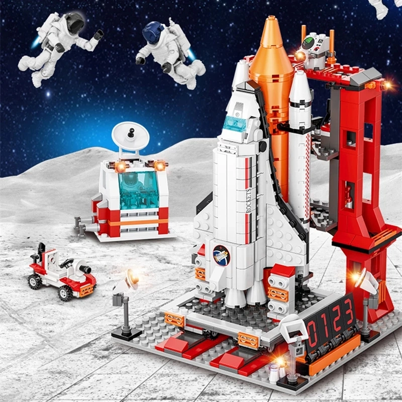 909PCS Ciudad Aeroespacial Rocket Launch Center Arquitectura Astronaut Figures Toys Kids Toys ladrillos educativos bloques de construcción bloques de juguetes para niños